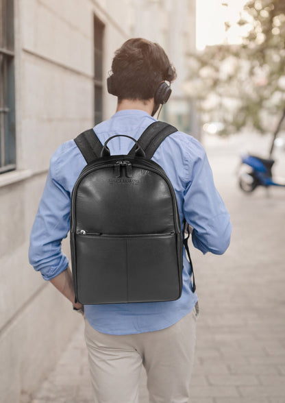 RB2001A | Netbook/Tablet Carrier Backpack in Nylon/Vera Leather, with light grain. Zipper closure and adjustable shoulder straps - Black color - Dimensions: 27 x 38 x 14 cm. Packaging: Non-Woven Fabric Bag